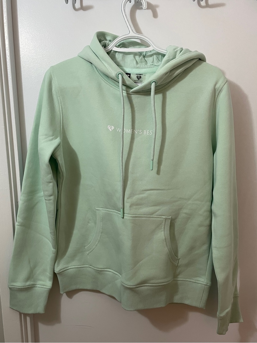 ‘Women’s Best’ light green hoodie